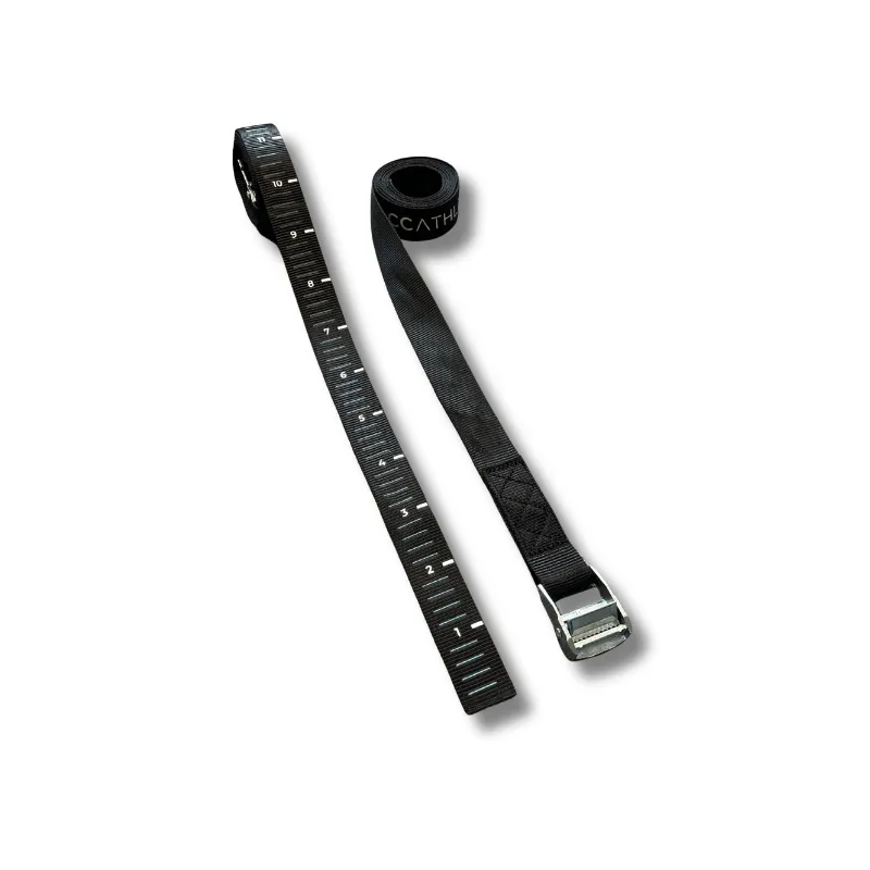 The two included IMTP straps — graduated webbing marked with numbered length positions, with a cam buckle